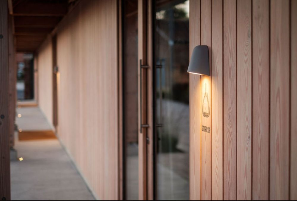 How bright should your indoor garage lighting be? See this Astro Lighting Mast textured grey outdoor wall light